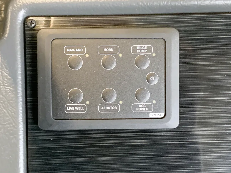 Slide: The Image of Control panel of a 2023 Starcraft Storm 166 SC Pro boat. - 13