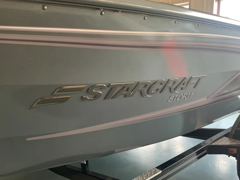 Slide: The Image of 2023 Starcraft Storm 166 SC Pro boat side view. - 16