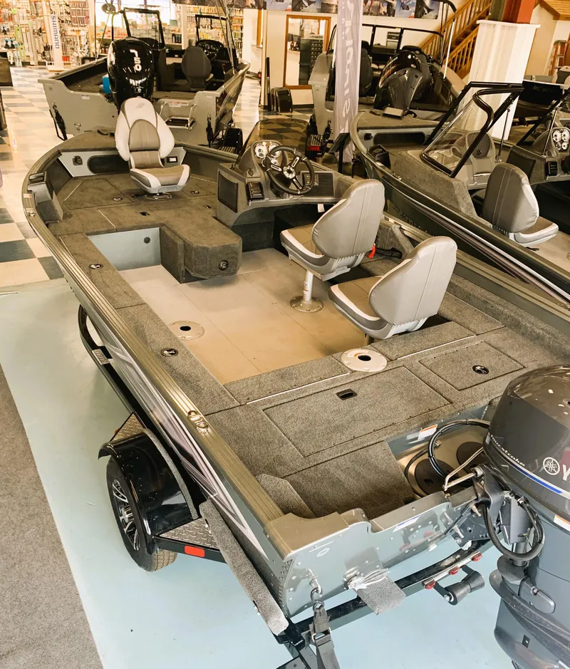Slide: The Image of 2023 Starcraft Storm 166 SC Pro fishing boat on display in showroom. - 6