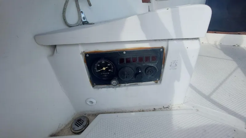 Slide: The Image of Control panel of a 1987 Hunter 34 sailboat cockpit. - 11