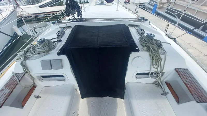 Slide: The Image of Cockpit of 1987 Hunter 34 sailboat with ropes and seating. - 12