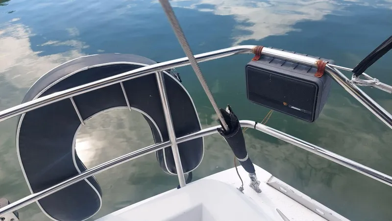 Slide: The Image of Sailboat deck with life preserver and speaker, Hunter 34, 1987 model. - 9