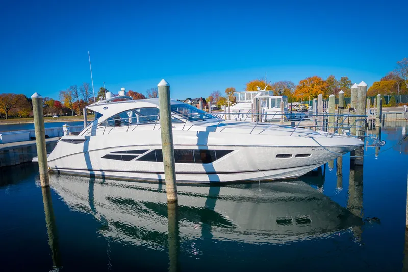 Slide: The Image of 2015 Sea Ray Sundancer 510 yacht docked in a marina. - 1