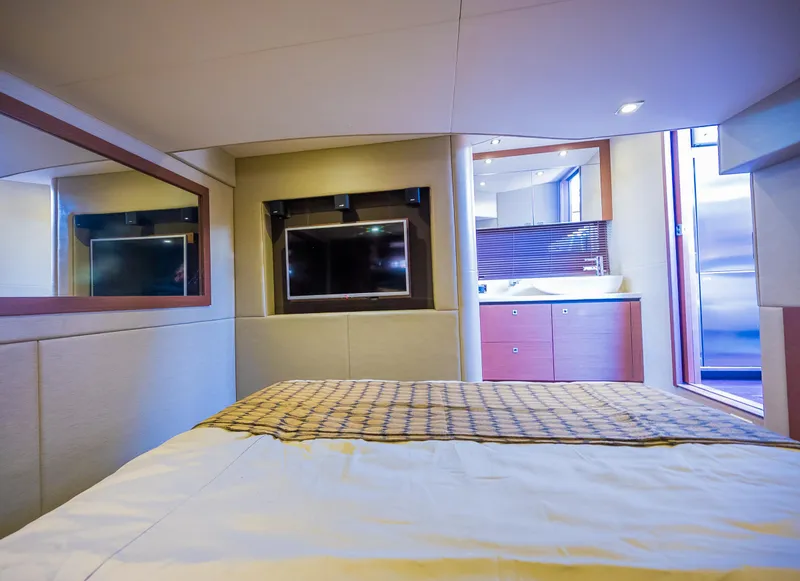 Slide: The Image of Luxurious bedroom interior of 2015 Sea Ray Sundancer 510 yacht with TV and ensuite bathroom. - 42