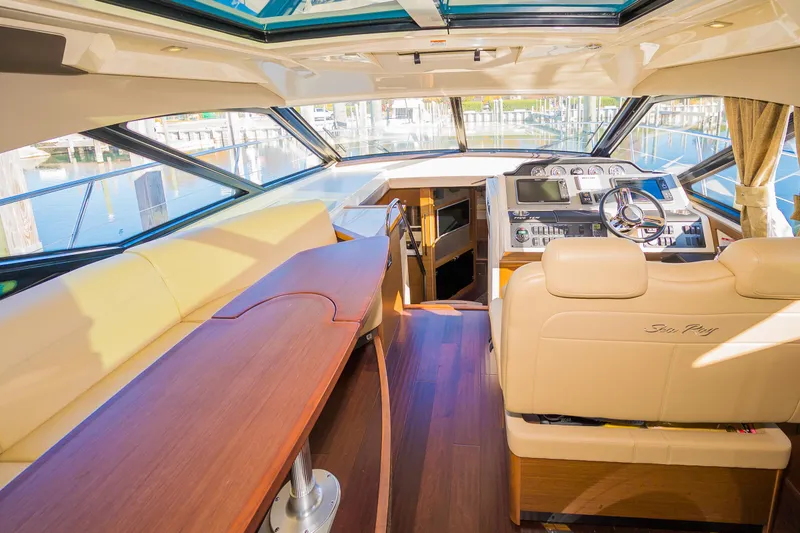 Slide: The Image of Luxurious interior of 2015 Sea Ray Sundancer 510 yacht with helm and seating area. - 47