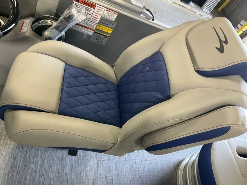 Slide: The Image of 2023 Bennington 22 LSB boat seat with blue and beige upholstery. - 23