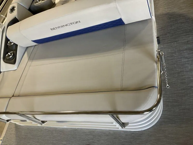 Slide: The Image of 2023 Bennington 22 LSB boat interior with white and blue seating. - 30