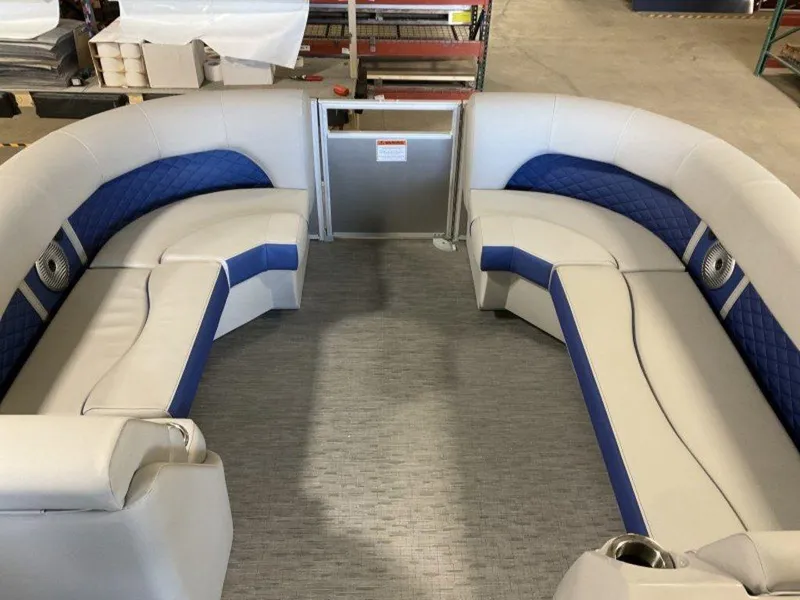 Slide: The Image of 2023 Bennington 22 LSB boat interior with blue and white seating. - 5