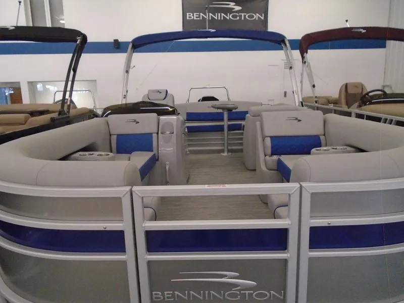 Slide: The Image of 2023 Bennington 22 LSB pontoon boat with spacious seating and modern design. - 7