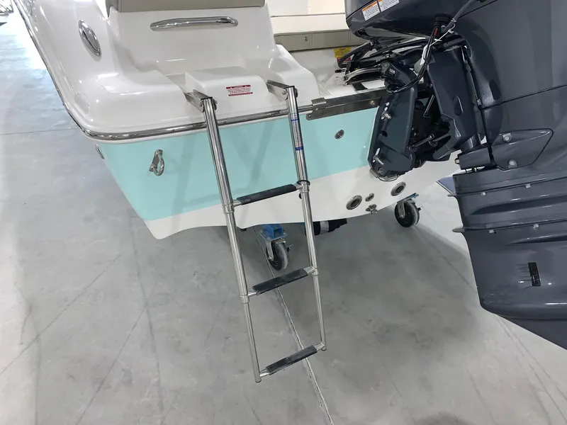 Slide: The Image of 2024 Key West 189 FS boat with ladder and outboard motor. - 3