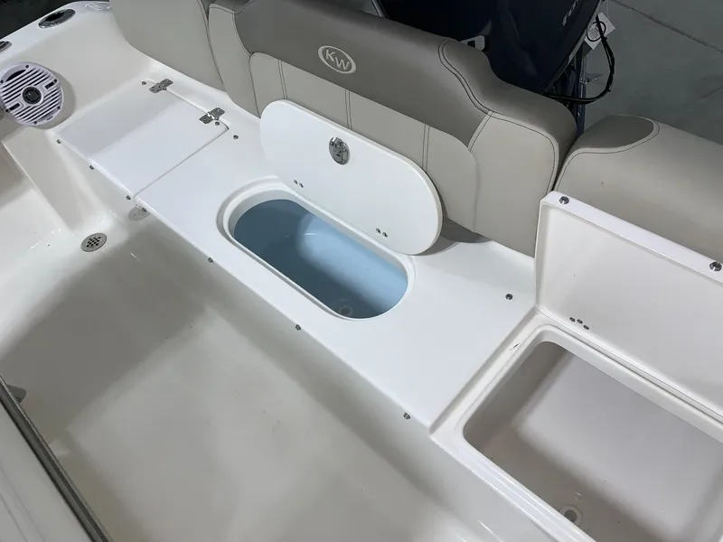 Slide: The Image of 2024 Key West 189 FS boat interior with storage compartments and seating. - 5