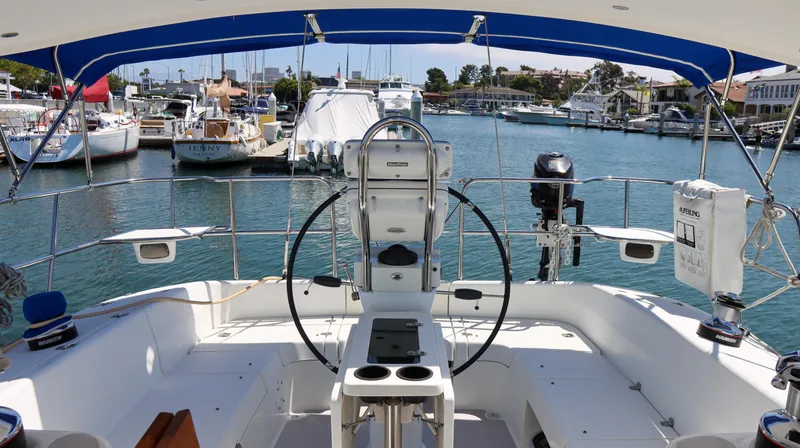 Slide: The Image of Cockpit view of 2010 Catalina 375 sailboat docked in a marina. - 7