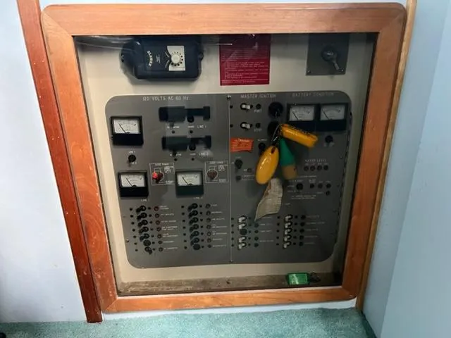 Slide: The Image of Electrical control panel of a 1990 Sea Ray 380 Aft Cabin boat. - 18