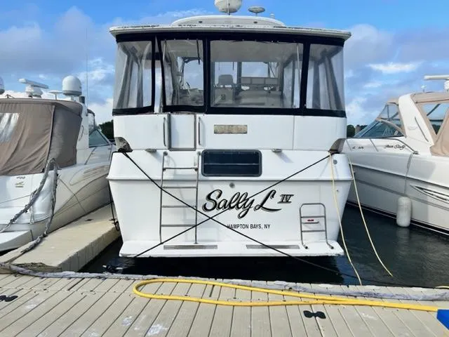 Slide: The Image of 1990 Sea Ray 380 Aft Cabin yacht docked at marina, named Sally L IV. - 21