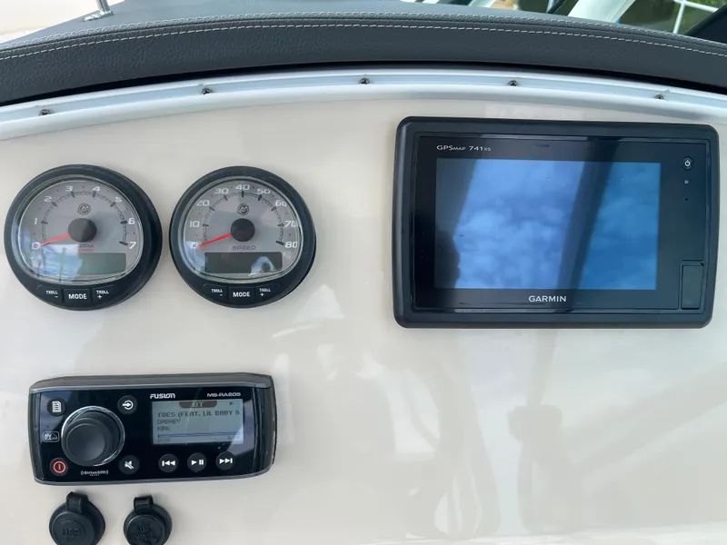 Slide: The Image of Dashboard of a 2016 Boston Whaler 230 Vantage with Garmin GPS and Fusion radio. - 26