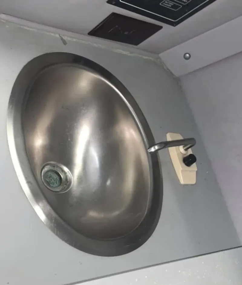 Slide: The Image of Stainless steel sink in a 1989 Fountain 12m boat. - 10