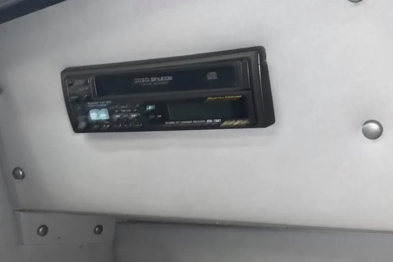 Slide: The Image of 1989 Fountain 12m boat stereo system, close-up view. - 11