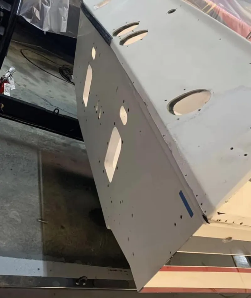 Slide: The Image of 1989 Fountain 12m boat hull in a workshop. - 14