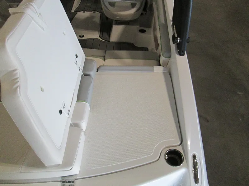 Slide: The Image of 2023 Tahoe 210 Si Limited boat interior seating and deck area. - 20