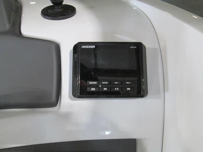 Slide: The Image of Kicker audio system in 2023 Tahoe 210 Si Limited boat. - 24