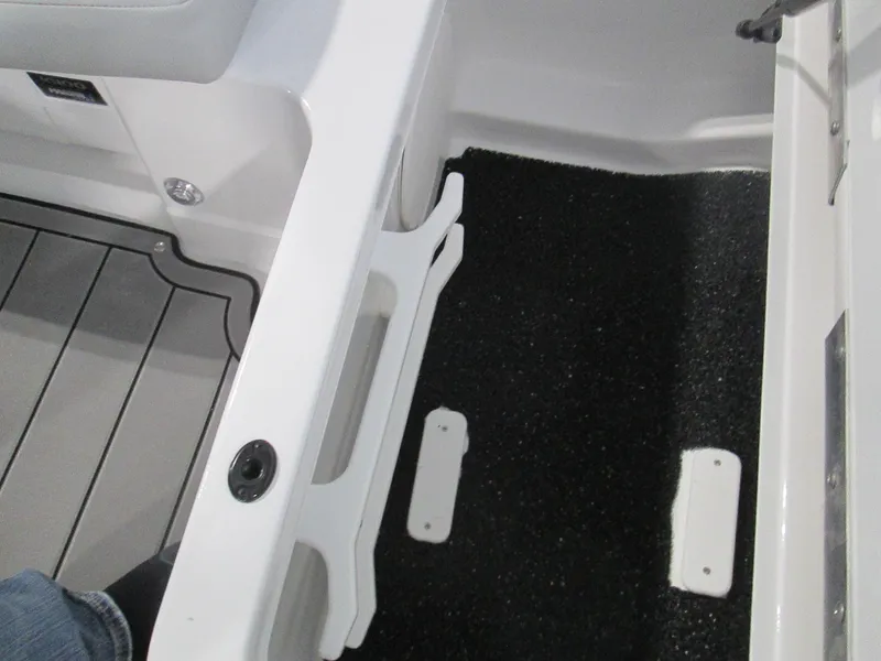Slide: The Image of 2023 Tahoe 210 Si Limited boat interior with white and black detailing. - 33