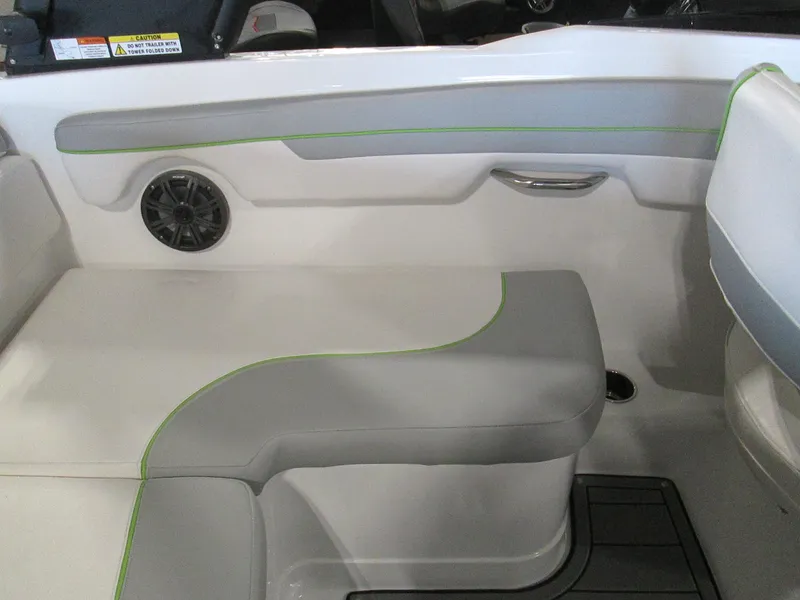 Slide: The Image of Interior seating of 2023 Tahoe 210 Si Limited boat with gray and green accents. - 36