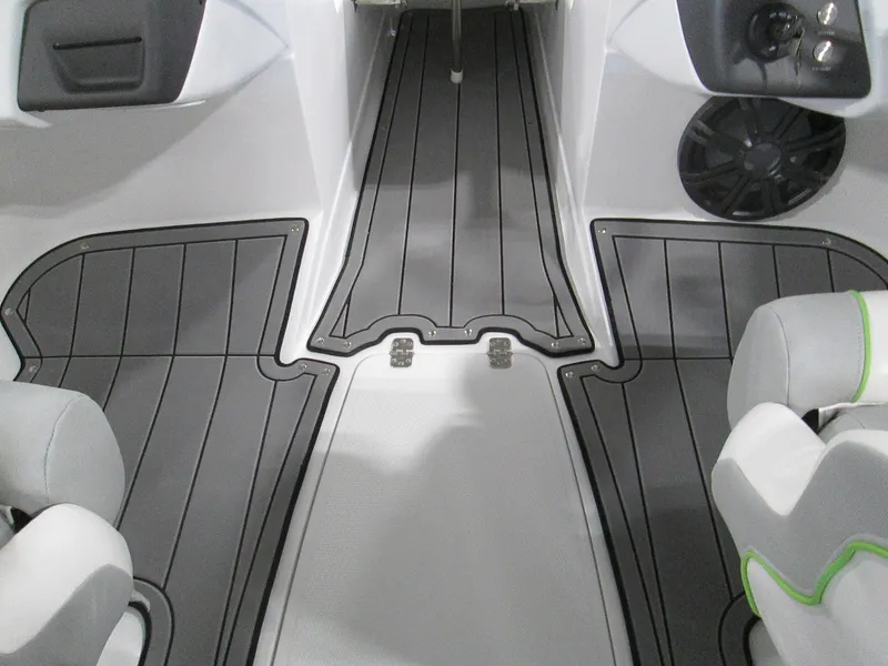 Slide: The Image of 2023 Tahoe 210 Si Limited boat interior with gray flooring and seating. - 38