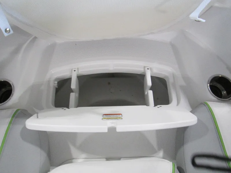 Slide: The Image of 2023 Tahoe 210 Si Limited boat interior storage compartment. - 40