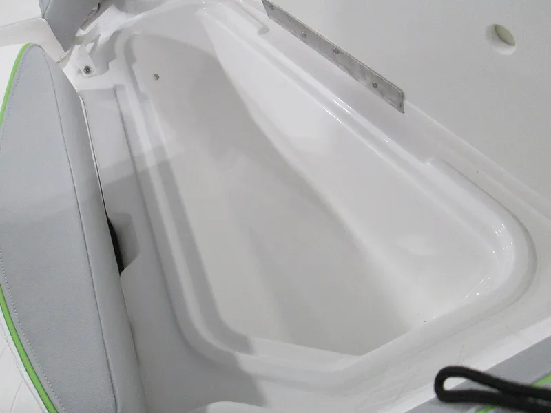 Slide: The Image of 2023 Tahoe 210 Si Limited boat storage compartment. - 41