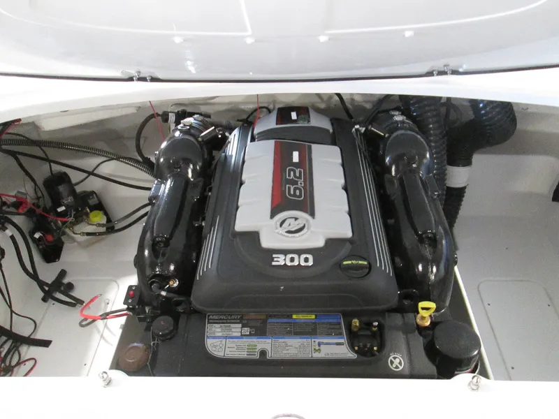 Slide: The Image of 2023 Tahoe 210 Si Limited boat engine compartment with 6.2L 300 HP engine. - 45