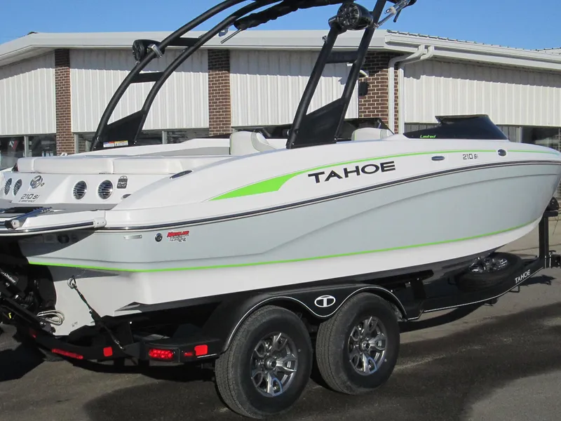 Slide: The Image of 2023 Tahoe 210 Si Limited boat on trailer, side view. - 6