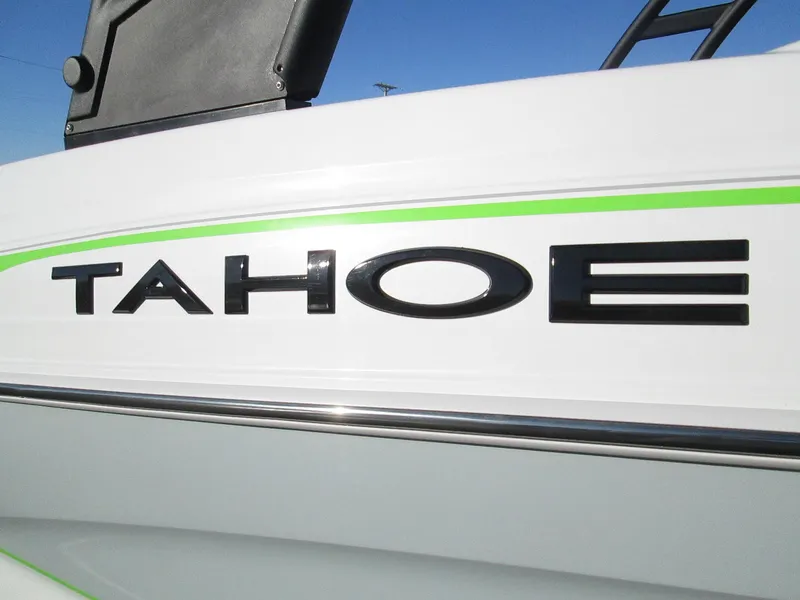 Slide: The Image of 2023 Tahoe 210 Si Limited boat logo close-up - 8
