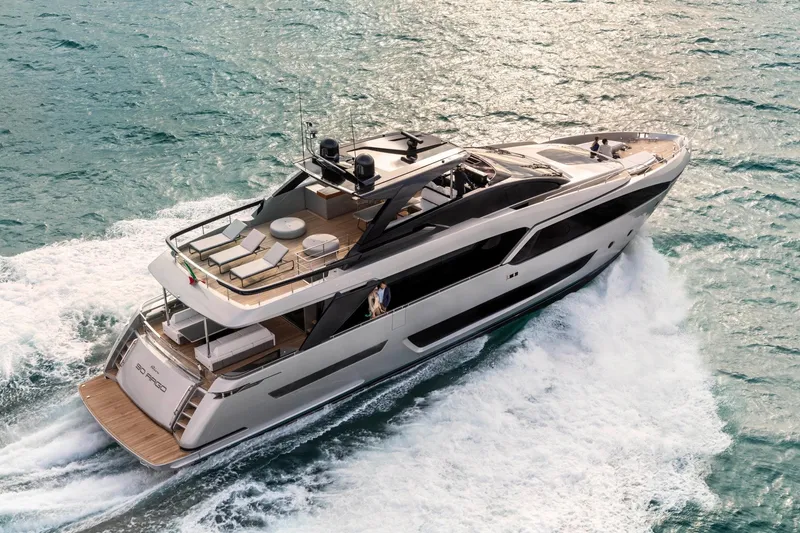 Slide: The Image of 2024 Riva 90' Argo luxury yacht cruising on the ocean. - 1