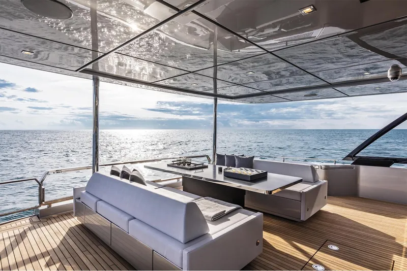 Slide: The Image of Luxurious deck of 2024 Riva 90' Argo yacht with ocean view. - 13