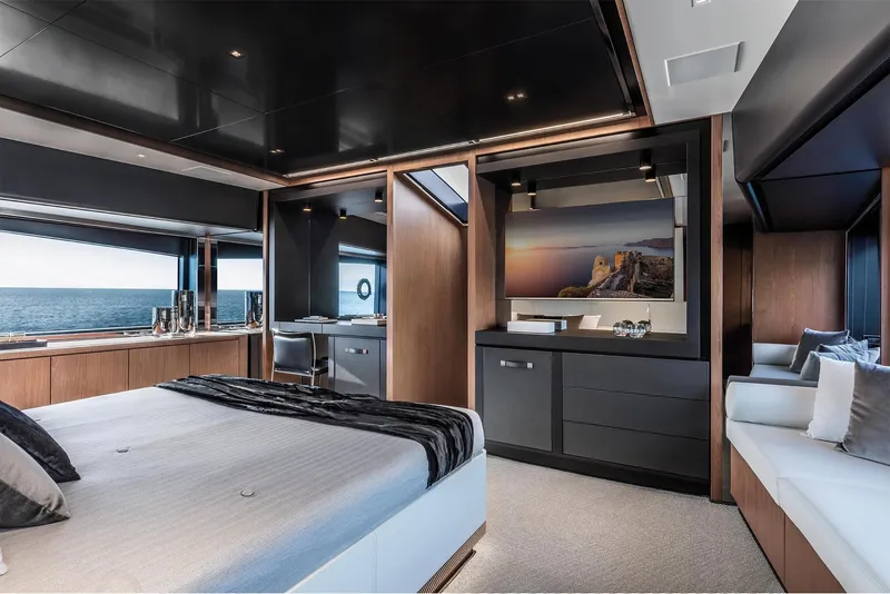 Slide: The Image of Luxurious bedroom interior of 2024 Riva 90' Argo yacht with ocean view. - 27
