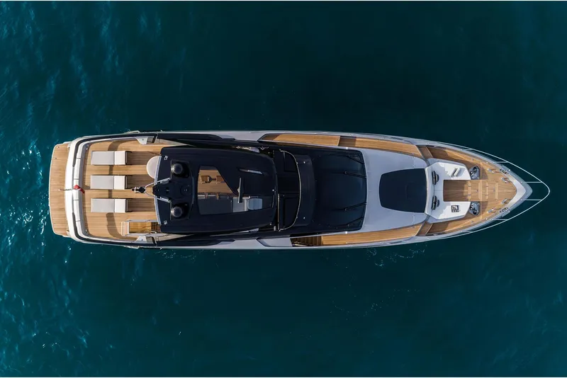 Slide: The Image of Aerial view of 2024 Riva 90' Argo luxury yacht on blue water. - 6