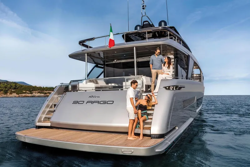 Slide: The Image of 2024 Riva 90' Argo luxury yacht with people enjoying the deck. - 7