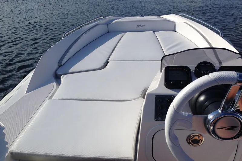 Slide: The Image of 2026 Zar Formenti ZF-3 Custom Colors Tender on water, featuring sleek white seating and modern controls. - 11