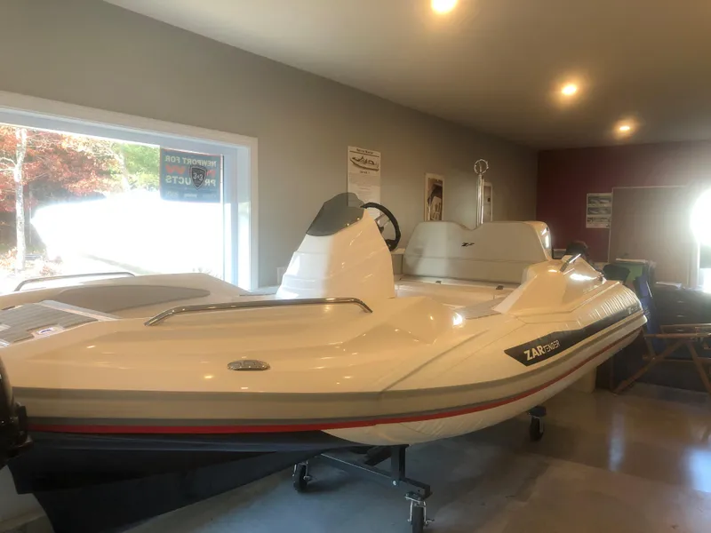 Slide: The Image of 2023 Zar Formenti Tender ZF-3 Custom Colors on display in a showroom. - 3