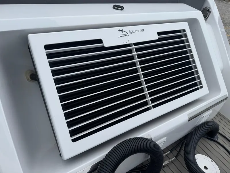 Slide: The Image of 2023 Iguana Sport yacht ventilation system with sleek white grille design. - 20