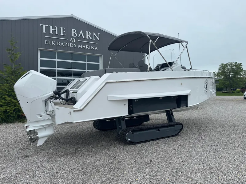 Slide: The Image of 2023 Iguana Sport boat with tracks at Elk Rapids Marina. - 3