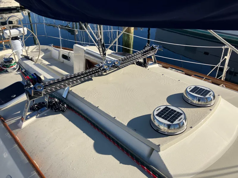 Slide: The Image of 1989 Pearson 39-2 sailboat deck with solar vents and rigging details. - 11