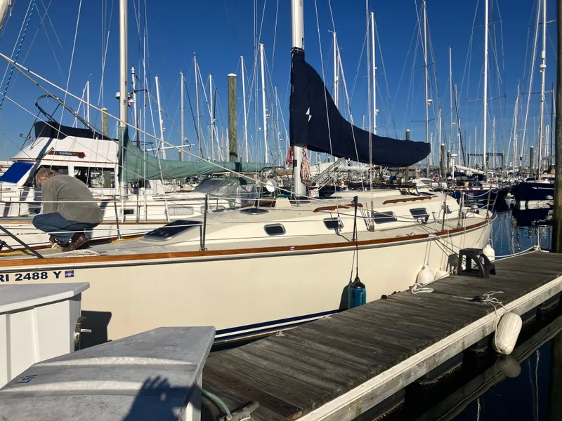Slide: The Image of Sailboat Pearson 39-2, 1989 model, docked at marina with clear blue sky. - 2