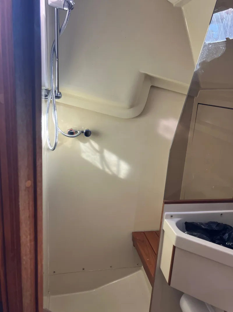 Slide: The Image of Interior of 1989 Pearson 39-2 sailboat bathroom with shower and sink. - 33