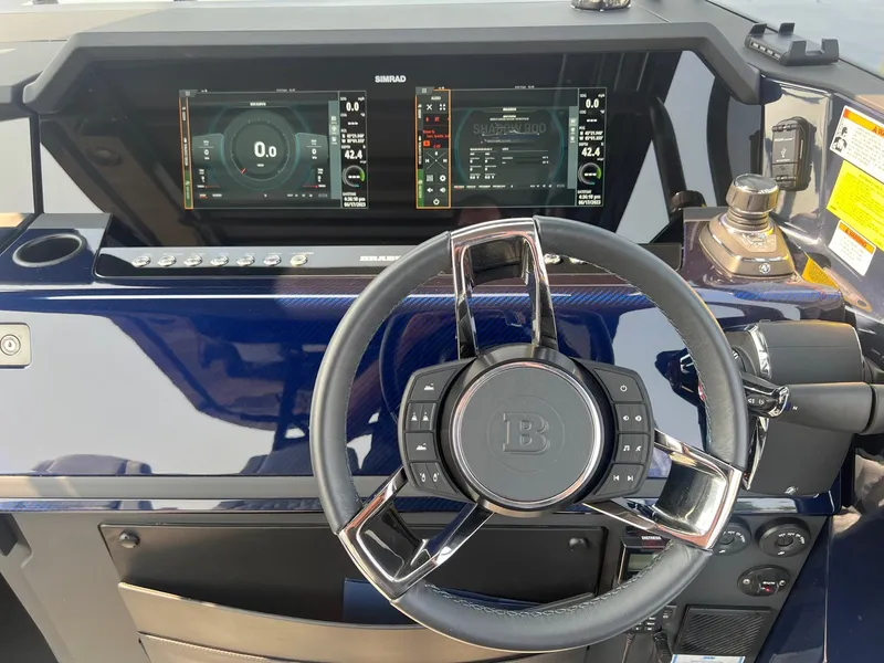 Slide: The Image of Cockpit of 2023 BRABUS Shadow 900 Deep Blue with advanced digital displays and sleek steering wheel. - 13