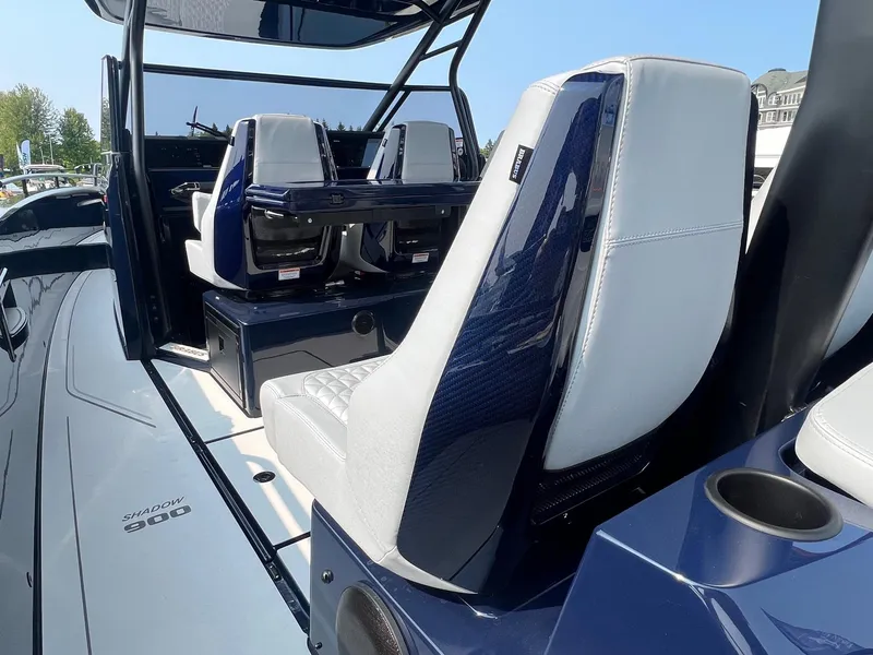 Slide: The Image of 2023 BRABUS Shadow 900 Deep Blue luxury boat interior with sleek seating. - 14