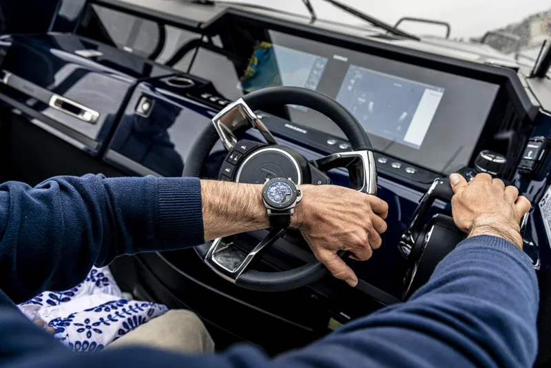 Slide: The Image of 2023 BRABUS Shadow 900 Deep Blue cockpit with steering wheel and advanced controls. - 44