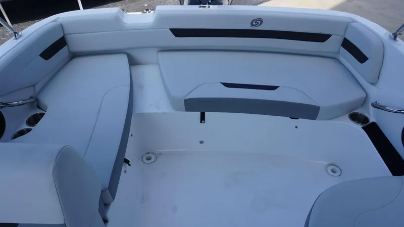 Slide: The Image of 2023 Hurricane 185 SS boat interior with white and gray seating. - 15