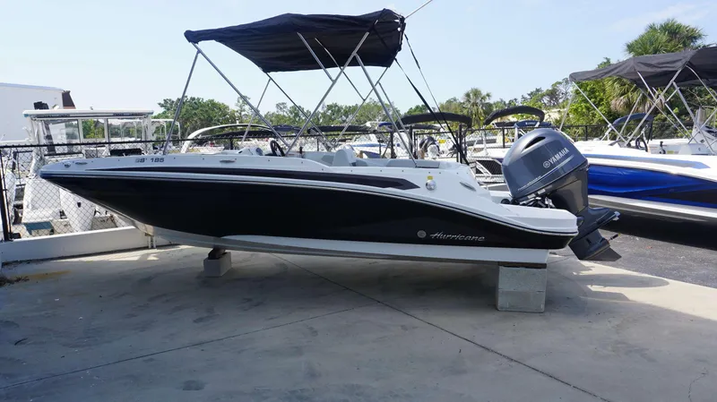 Slide: The Image of 2023 Hurricane 185 SS boat with Yamaha outboard motor on display. - 16