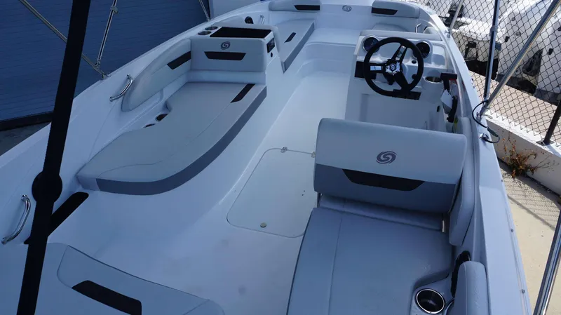 Slide: The Image of 2023 Hurricane 185 SS boat interior with seating and steering wheel. - 8